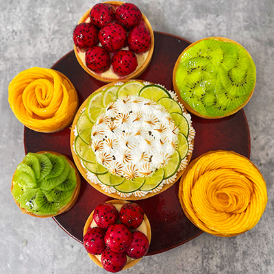 Lemon meringue pie and fruit tarts